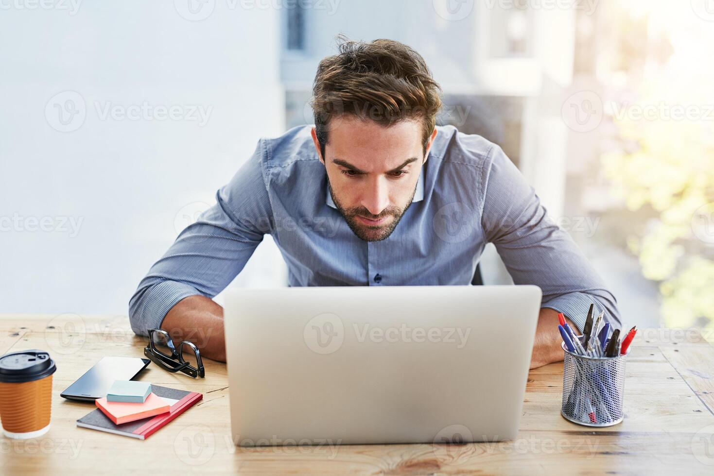 Worry, reading and businessman with laptop in office for surprise ...